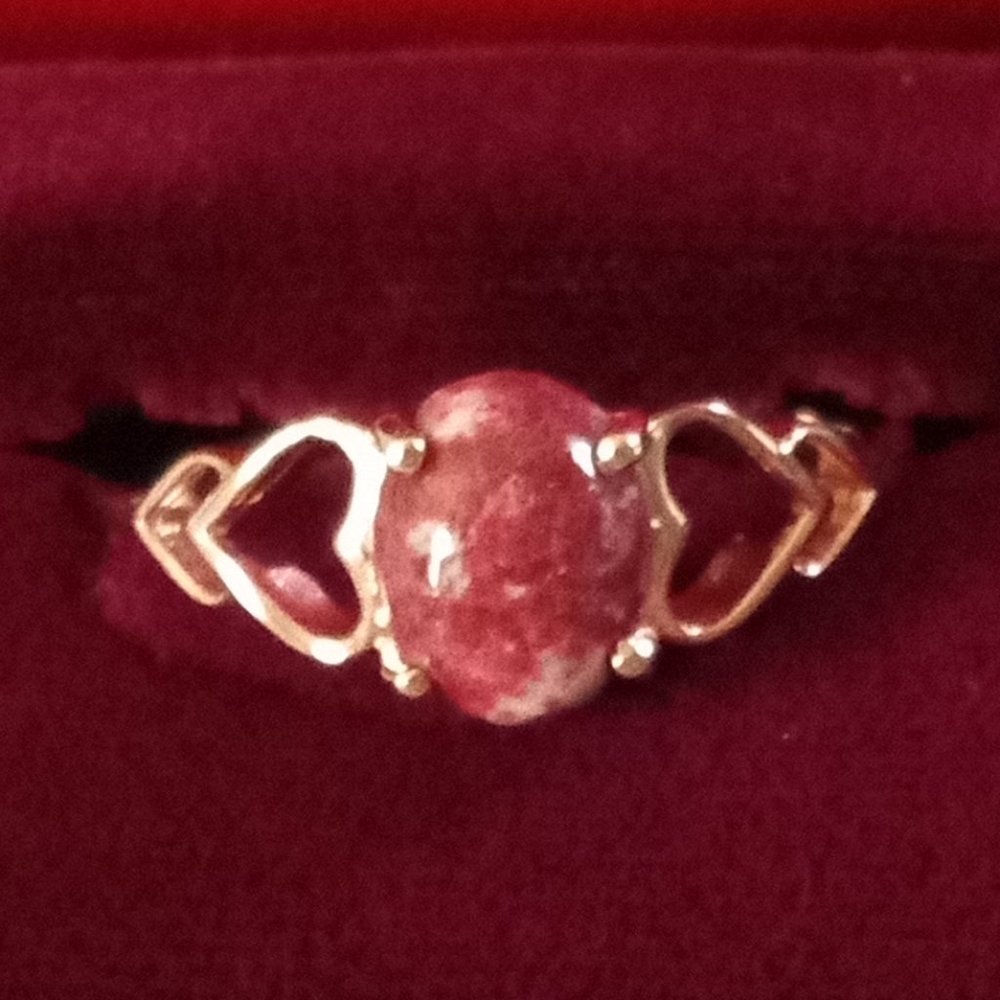 Thulite set in rose gold over sterling